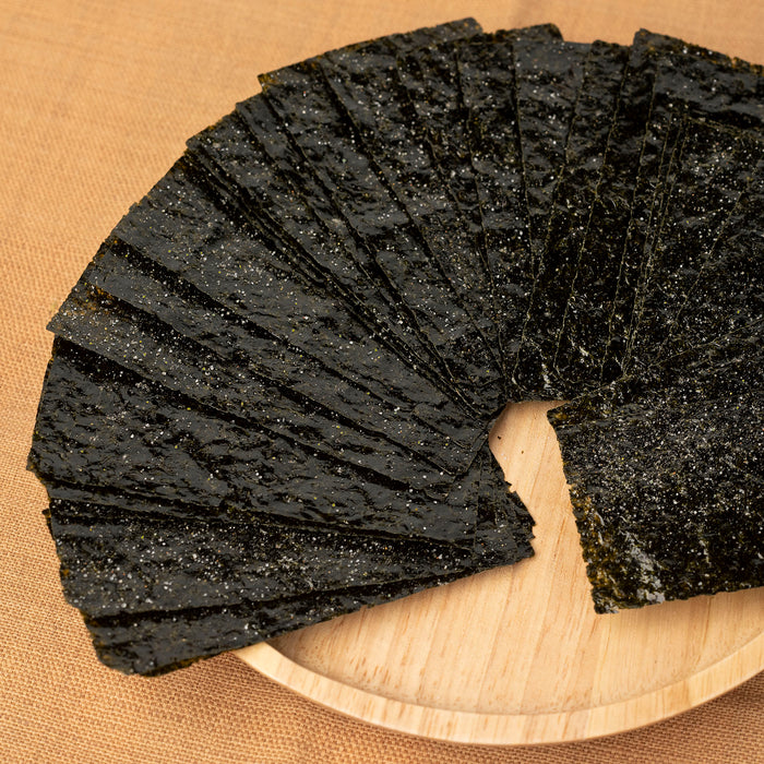 Nori snack placed on a wooden plate