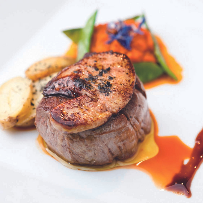 A plate of beef steak with shiso EVOO sauce