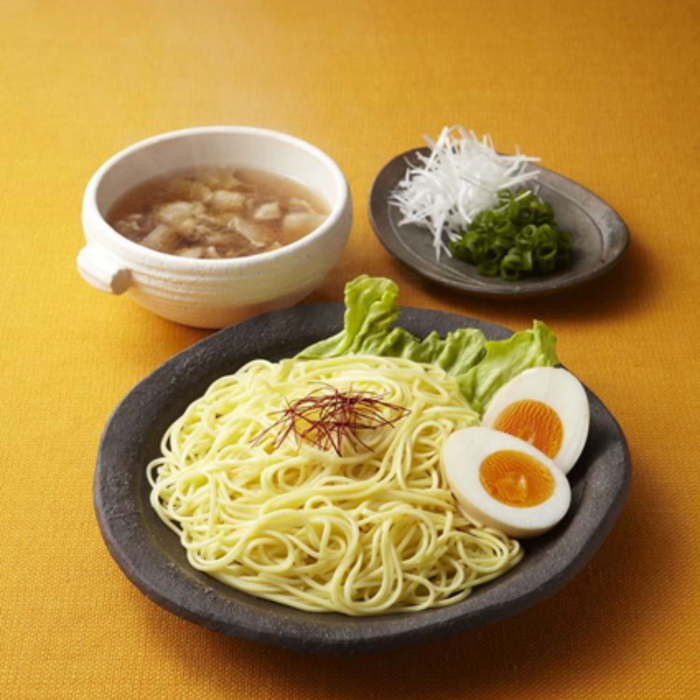 Ramen noodles with a bowl of soup