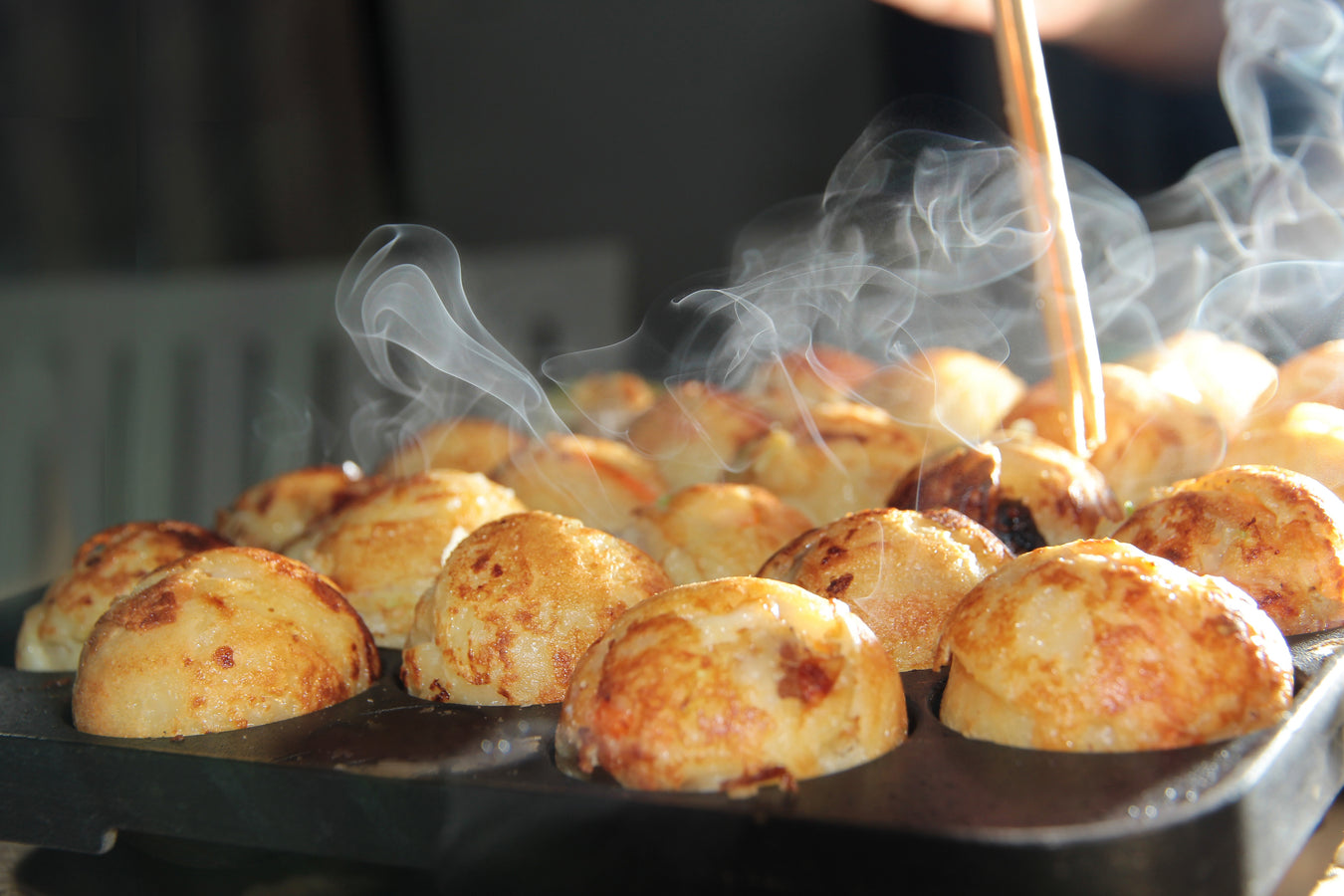Takoyaki octopus balls on hot plate