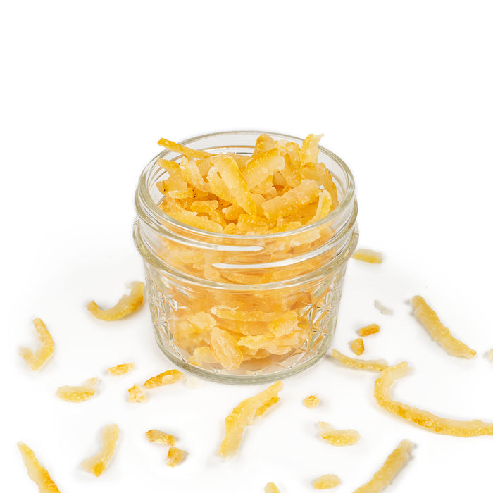 Dry candied Yuzu peels in a jar