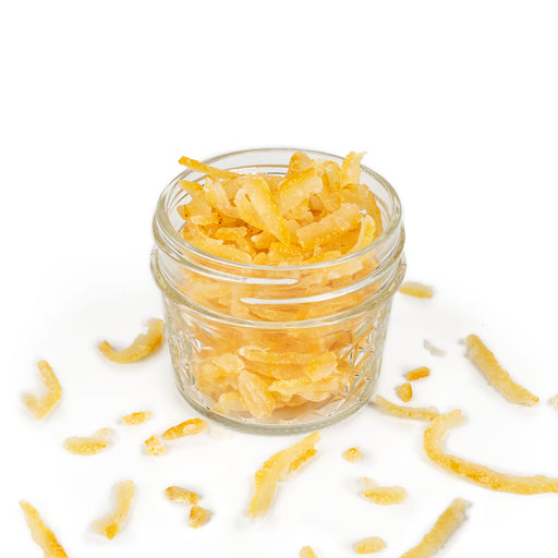Dry candied Yuzu peels in a jar