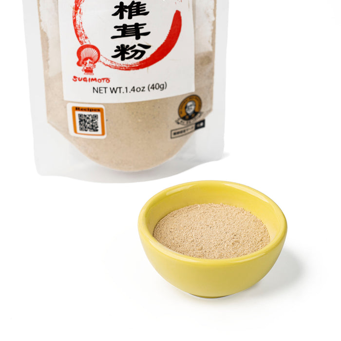 A bowl of shiitake mushroom powder next to package of the product