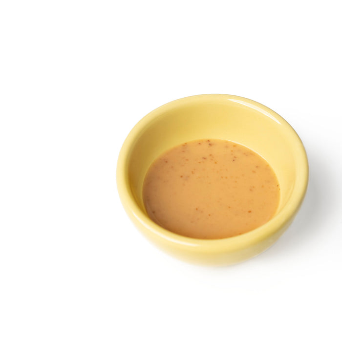 A small bowl of sesame dressing