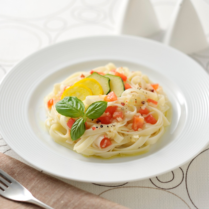 A bowl of kishimen noodles with olive oil sauce