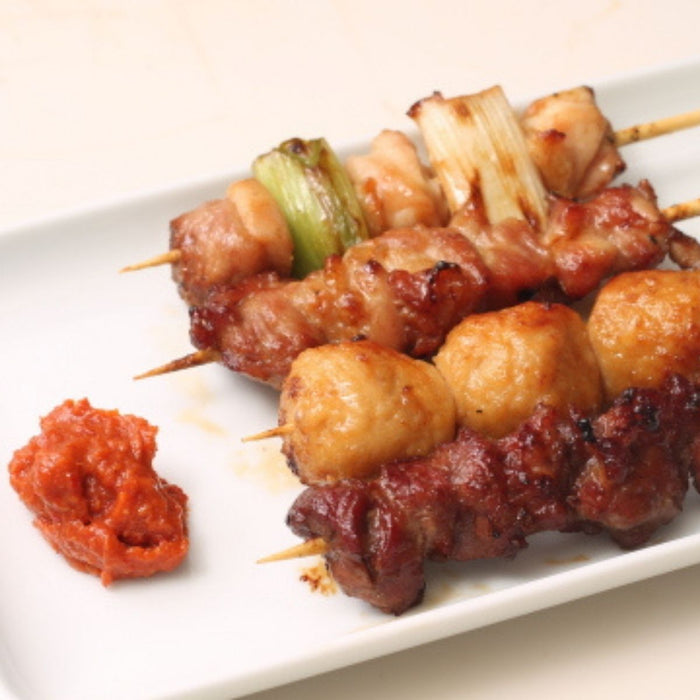A plate of yakitori skewers