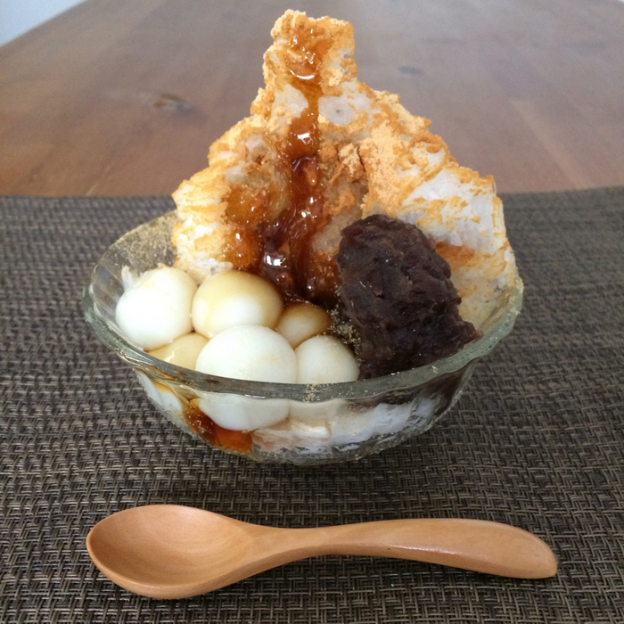 A bowl of shaved ice topped with kinako powder