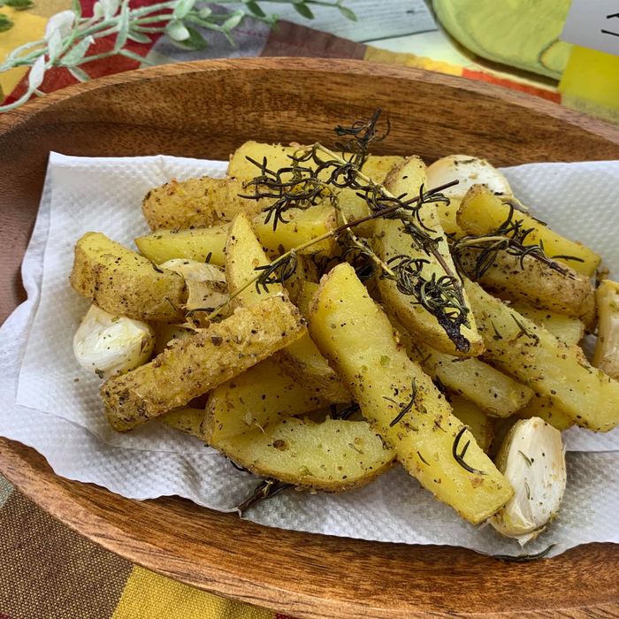 A bowl of french fries with shiitake mushroom powder