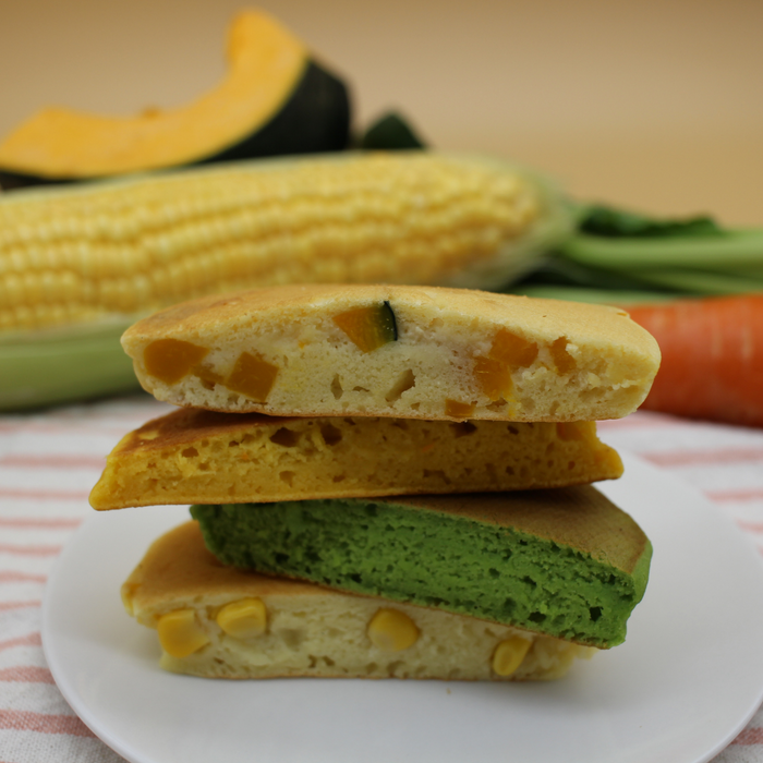 Savory pancakes piled on a plate