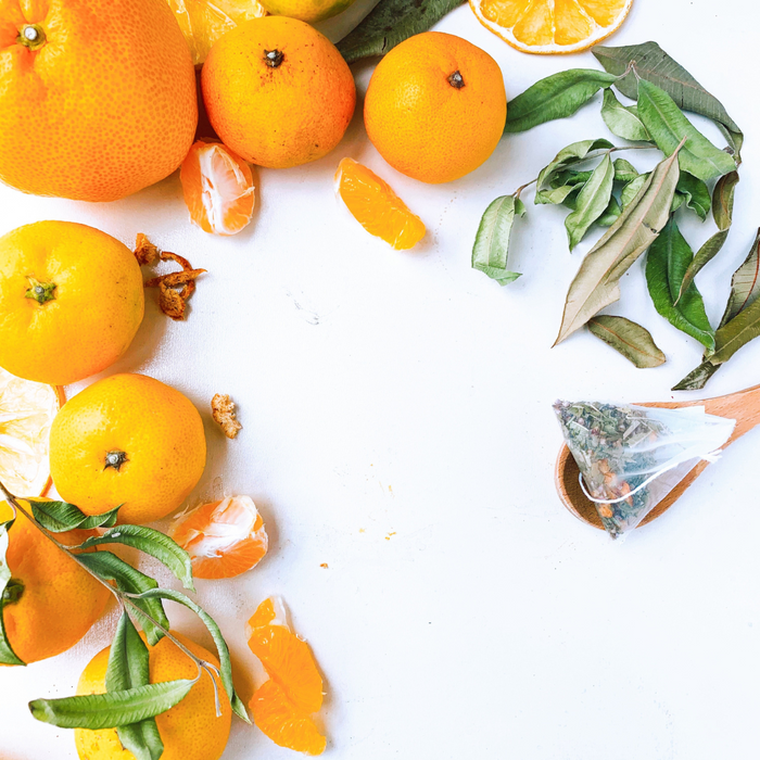 Mikan fruits and a tea bag of Ehime Mikan Tea