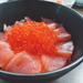 A sashimi bowl topped with salmon roe