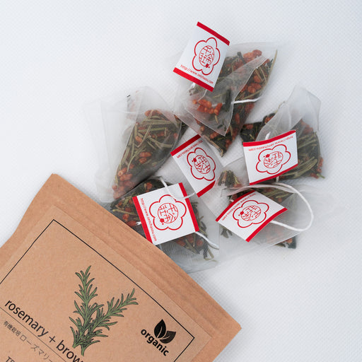 Tea bags popping out of a package bag