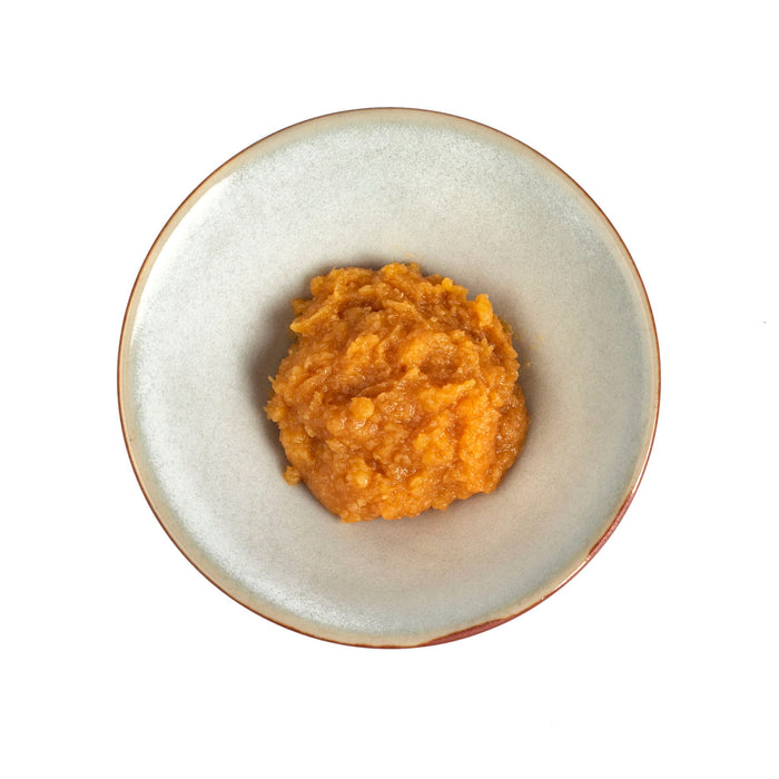 Overhead angle of small bowl of organic koji miso