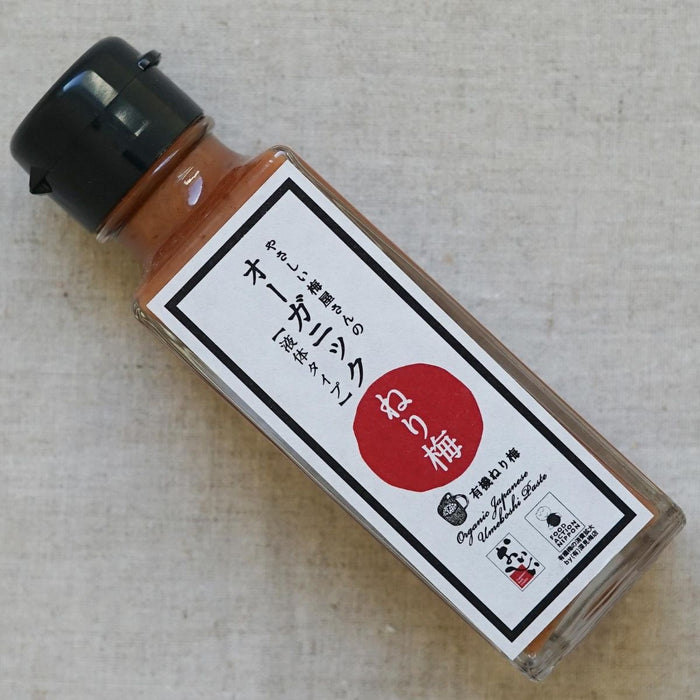 A bottle of the product on ivory colored cloth- diagonal angle