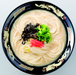A bowl of tonkotsu ramen noodles with pickled ginger, bamboo shoot and scallion