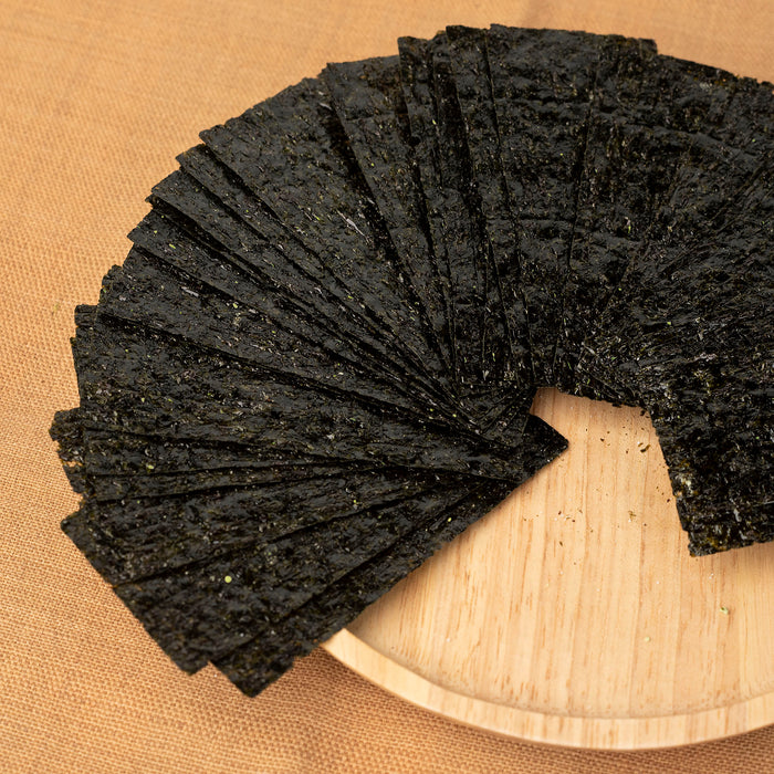 Nori snacks placed on a wooden plate