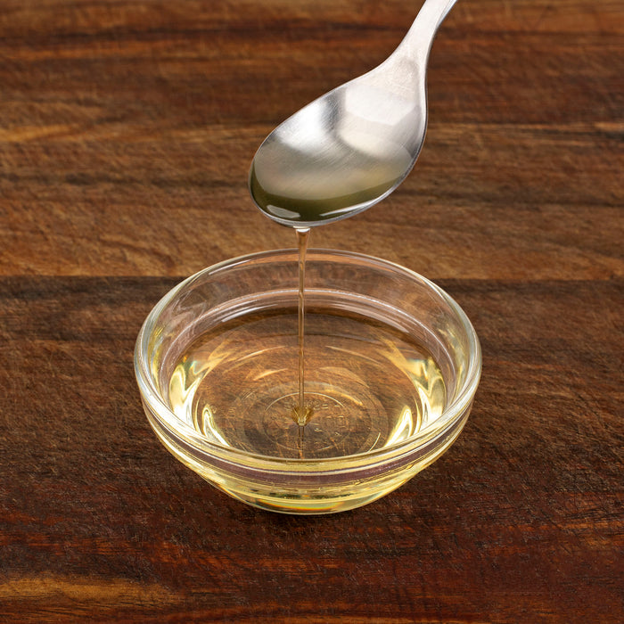 A spoon of Pure Rice Bran Oil