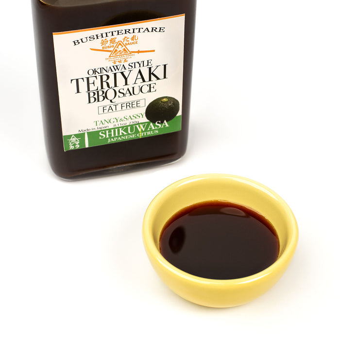 A bowl of Shikuwasa Teriyaki Sauce next to package bottle