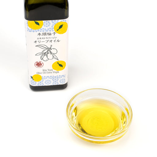 A bowl of Yuzu EVOO next to the package bottle