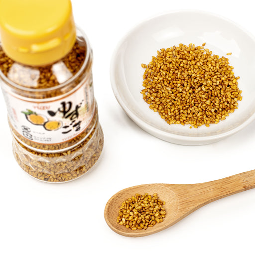 A spoon of yuzu roasted sesame seeds