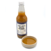 Shio-Koji sauce bottle with a small bowl of sauce on a white background