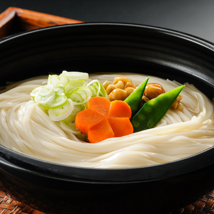A bowl of hot udon noodles