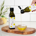 Man pouring yuzu extra olive oil into a bowl