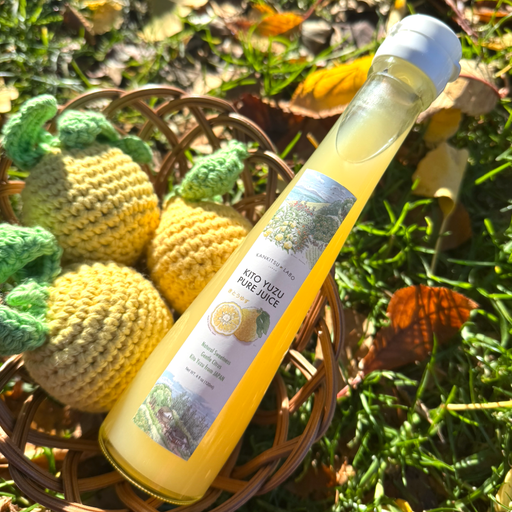 A package bottle of yuzu extract on a ground