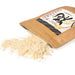 Scattered organic brown rice koji powder out of package