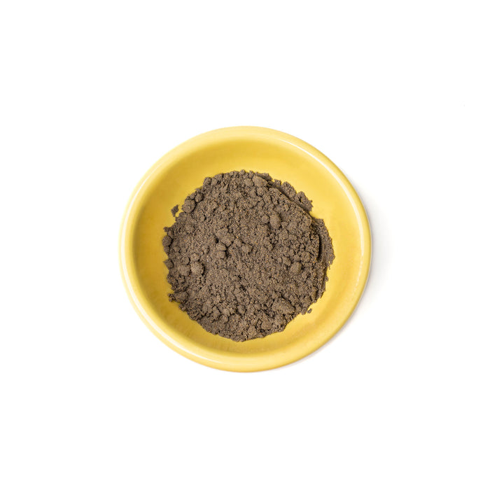 A small bowl of black sesame latte mix