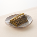 A plate of pickled daikon radish greens