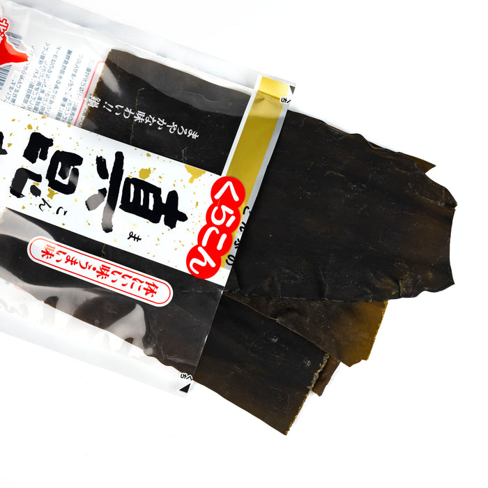 Dried kombu kelp popping out of package of the product - overhead shot