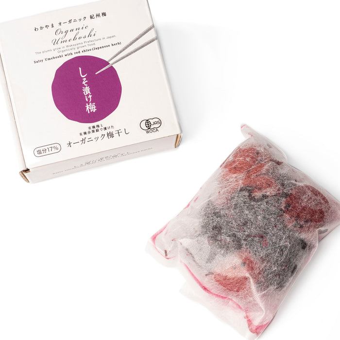 An internal package of organic umeboshi next to the package box