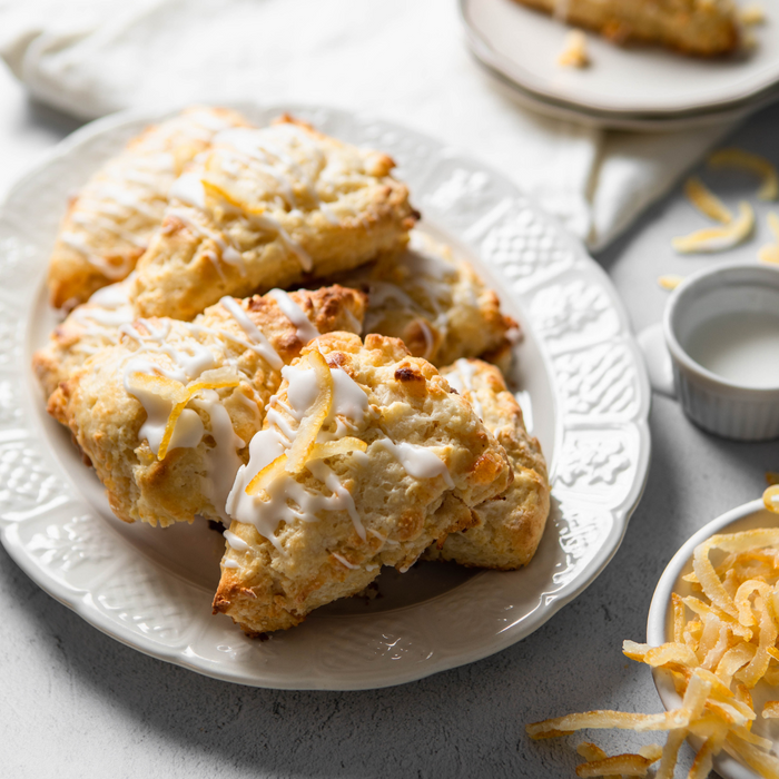 A plate of scones with dry candied yuzu peels
